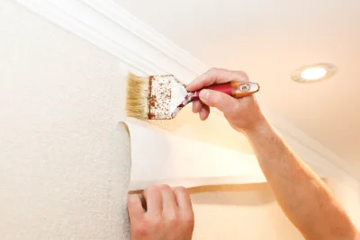 Pose de papier peint à Cresseveuille — revêtements muraux et toiles de verre